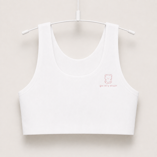Gently first bra in white with embroidered bear logo, seamless wire-free longline crop on a hanger