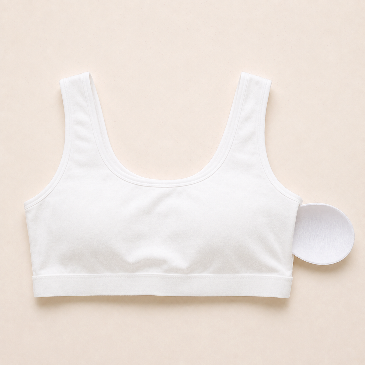 Soft removable pad sliding out of the side opening of The Cotton One