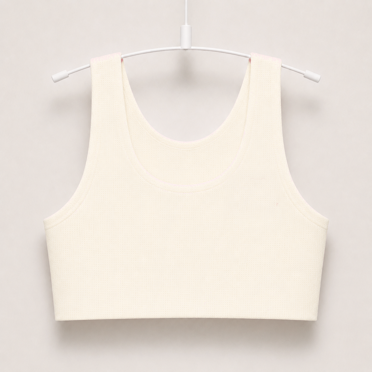 Gently first bra in beige on a hanger