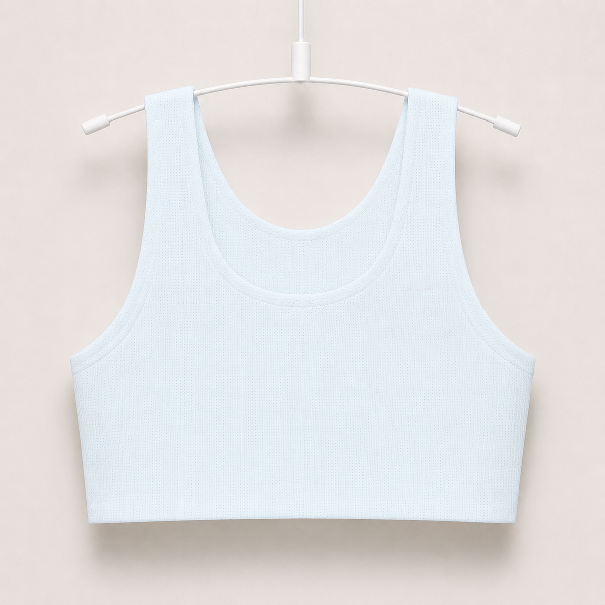 Gently first bra in ice blue on a hanger
