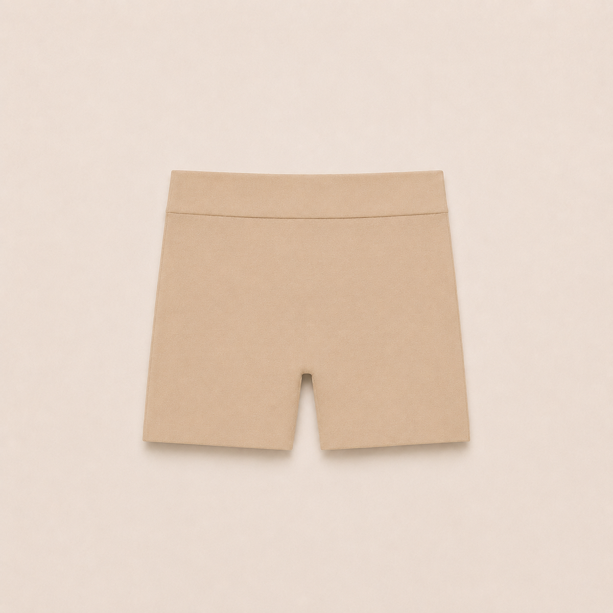 Gently Play Shorts in beige, seamless under-skirt shorts for girls, laid flat