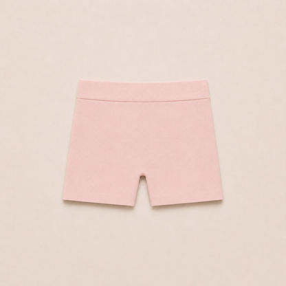 Gently Play Shorts in blush pink, seamless under-skirt shorts for girls, laid flat