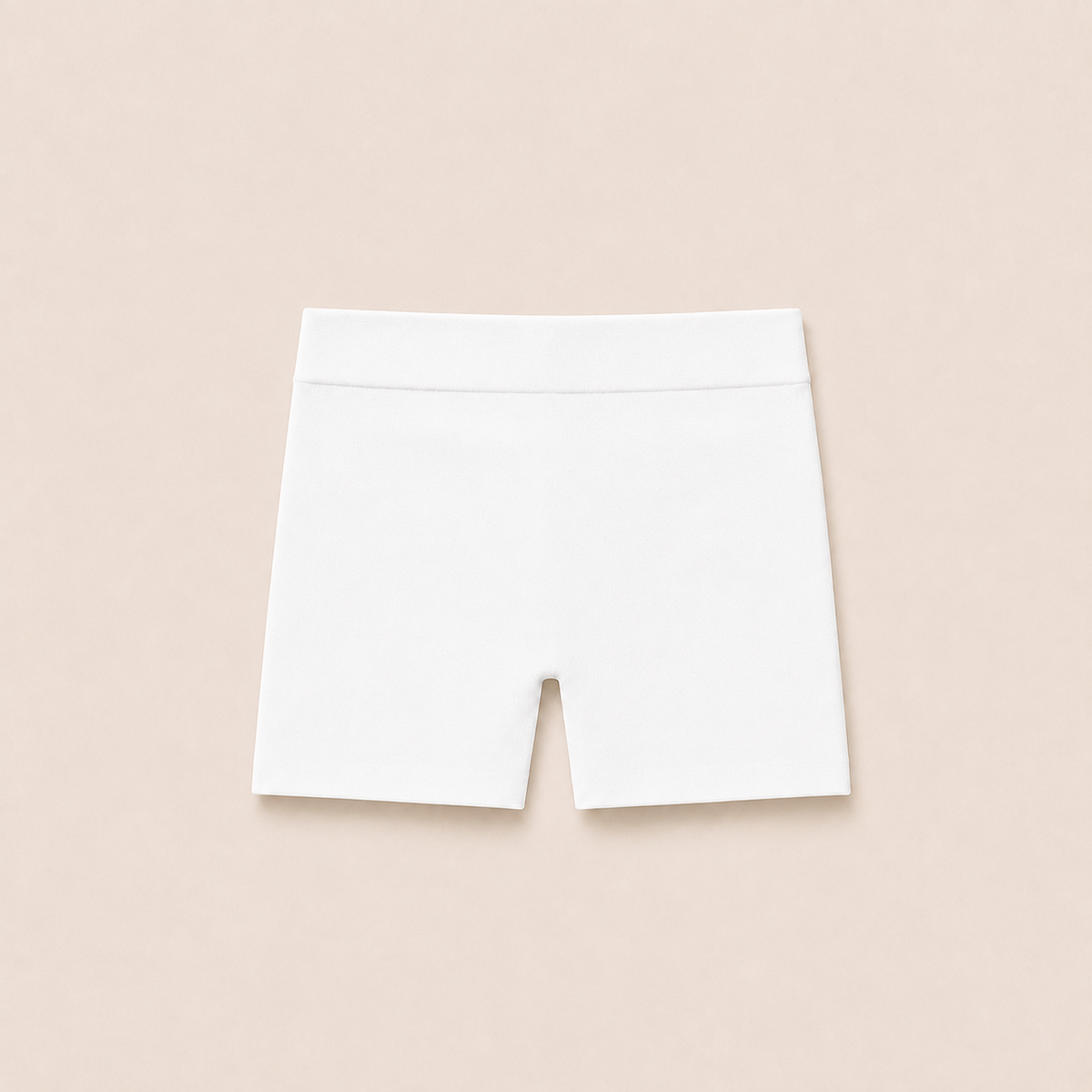 Gently Play Shorts in white, seamless under-skirt shorts for girls, laid flat