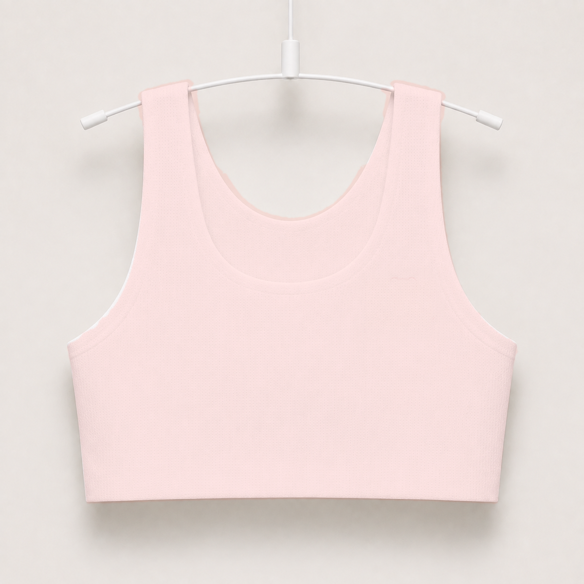 Gently first bra in pink on a hanger